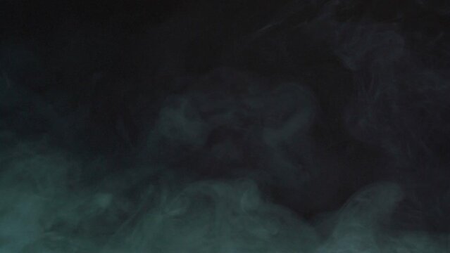 White smoke isolated on dark background. Foggy background.