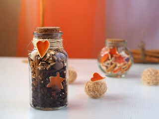 Dry aromatic potpourri  in a glass bottle