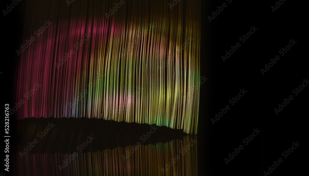 Aufkleber Close up Beautiful book pages in the color light on a night. Background pattern for design. Macro photography view.