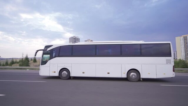 Bus on highway.
The bus is driving on the highway.
