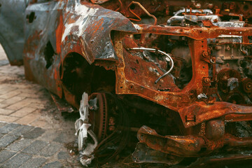 Burnt car during Russian aggression in Ukraine