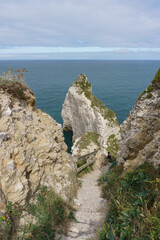 The cliff of Falaise d'Amont on a summer day in Etretat, Normandy, France