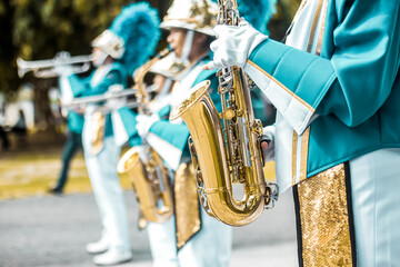 Group of students saxophone, School band performs in marching band