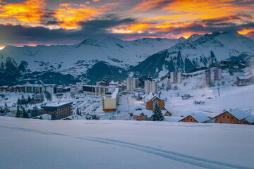 Beautiful alpine ski resort with spectacular sunrise, La Toussuire, France