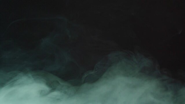 White smoke isolated on dark background. Foggy background.