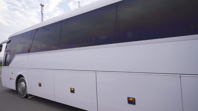 Close-up bus going on highway.
The long-distance bus is going on the highway.
