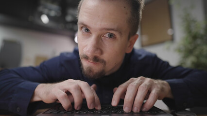 Online troll rage trashing on keyboard from home kitchen