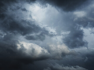 The sky is full of dark clouds in bad weather before a thunderstorm.