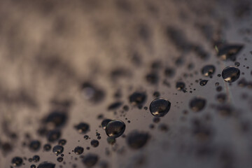 Water drops on coated car glass closeup