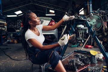 Obraz na płótnie Canvas Auto mechanic are repair mechanical part and maintenance auto engine is problems at car repair shop.