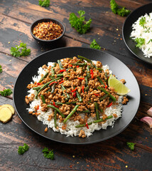 Pork Stir Fry with Green Beans, rice, garlic, chili and ginger. Asian food.