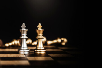 King chess stand front the line on chessboard concept of challenge or team player or business team and leadership strategy or strategic planning and human resources organization risk management.