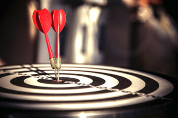 Fototapeta premium Bullseye target goal or dartboard has dart arrow throw hitting center shooting for financial business targeting planning to winner concept.