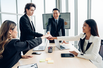 Stack of hands symbolizing trust and cooperation, Group of professional business people are working and brainstorming discussed about work in conference room.