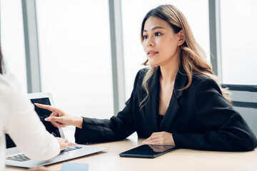 Business partners having meeting in coworking office space