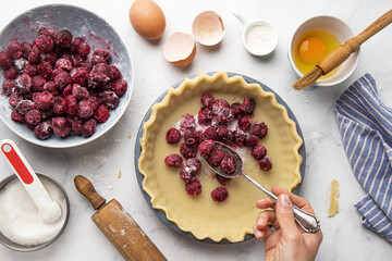 Preparation homemade pie or tart with cherry filling. Making pie series
