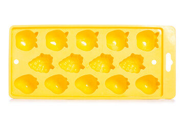 Yellow form for ice cube on white background isolation