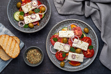 Food photography of greek salad, feta, cucumber, onion, tomato,  olive