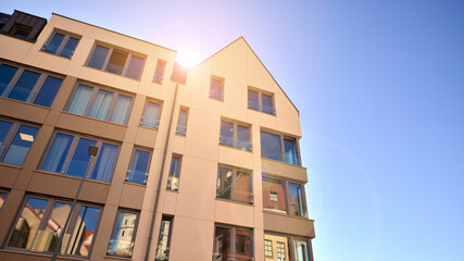 Modern residential building on a sunny day. Apartment house.