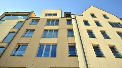 Modern residential building on a sunny day. Apartment house.