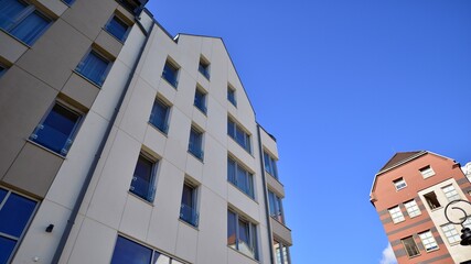 Modern residential building on a sunny day. Apartment house.