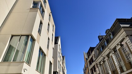 Fototapeta na wymiar Modern residential building on a sunny day. Apartment house.