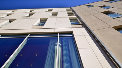 Obraz premium Modern residential building on a sunny day. Apartment house.