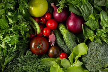 Fresh vegetables with herbs collection at table. Natural healthy homemade food diet concept