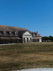 Obraz premium Arc-et-Senans, France 2022: Visit the magnificent Royal Saltworks built in the 18th century by the royal architect Claude-Nicolas LEDOUX.