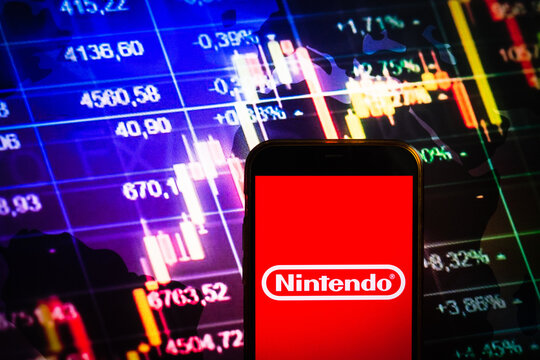 KONSKIE, POLAND - August 30, 2022: Smartphone Displaying Logo Of Nintendo Company On Stock Exchange Chart Background