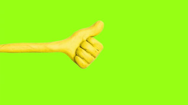 Thumbs up.Hand gestures animation of moving hand like and ok. Isolated on chroma key green screen background . Hand gesture stop motion animation. Cartoon video animation. Motion graphics.
