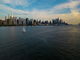 city skyline with boat new york city
