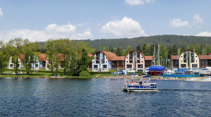 The village of Lipno on the banks of the Lipno Reservoir in South Bohemia - 528261320