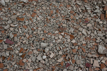 abstract background: gravel and pieces of broken tiles