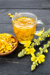 Herbal medicinal tea drink made of Verbascum thapsus, the great mullein, greater mullein or common...