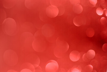 Red glitter abstract festive Christmas light background.