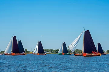 Wandaufkleber Traditional Frisian wooden sailing ships in a yearly competition in the Netherlands © Nataraj