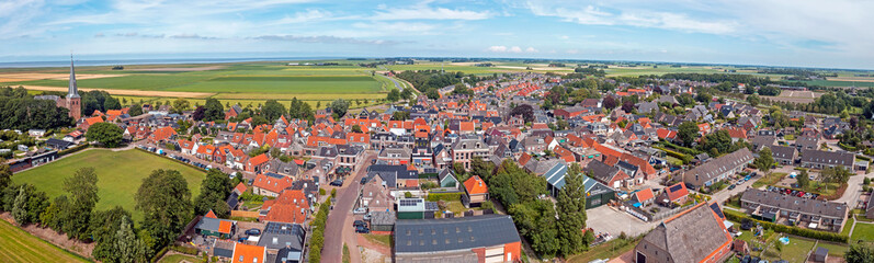 Fototapeta na wymiar Aerial panorama from the village Holwerd aan Zee in Friesland the Netherlands