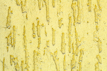 Yellow facade stucco background. Monolithic stucco decorative background. Silicate-cement plaster for walls.