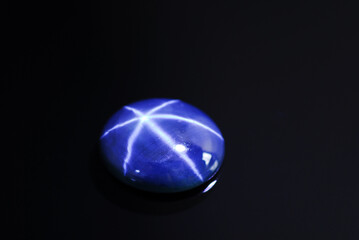 Natural rich blue star sapphire cabochone oval loose gemstone setting for making jewelry. Black...