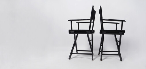 Two Black director chair isolated on white background.