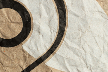 Crumpled brown beige paper. Texture background.