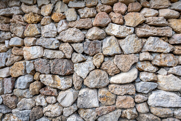 stone wall background and texture for cabin hut in the forest