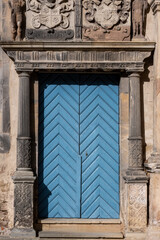 blue wooden door in old building