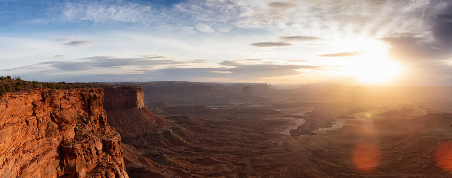 Scenic Panoramic View of American Landscape and Red Rock Mountains in Desert Canyon. Cloudy Sunrise Sky. Canyonlands National Park. Utah, United States. Nature Background Panorama © edb3_16