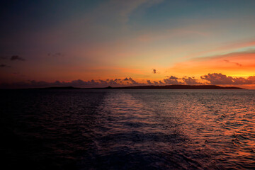 Fototapeta na wymiar sunset over the island