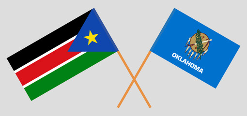 Crossed flags of South Sudan and The State of Oklahoma. Official colors. Correct proportion