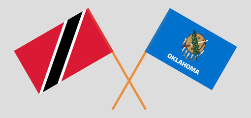 Crossed flags of Trinidad and Tobago and The State of Oklahoma. Official colors. Correct proportion