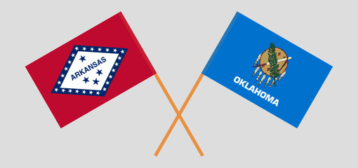 Crossed flags of The State of Arkansas and The State of Oklahoma. Official colors. Correct proportion