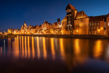 Gdańsk at night, a view of the Motława River, Gdańsk Granary and Gdańsk Old Town. Gdańsk...